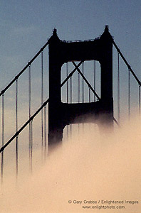 Fog and Golden Gate Bridge at sunrise, from the Marin Headlands, California