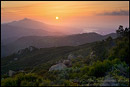 Picture: Sunset over Santa Ynez Peak, and the distant Lake Cachuma, from the Santa Ynez Mountains, near Santa Barbara, California 