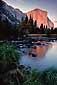 Alpenglow on El Capitan at sunset and reflection in the Merced River, Yosemite Valley, Yosemite National Park, California