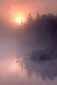 Misty morning sunrise on unnamed lake, Adirondack Mountains, New York